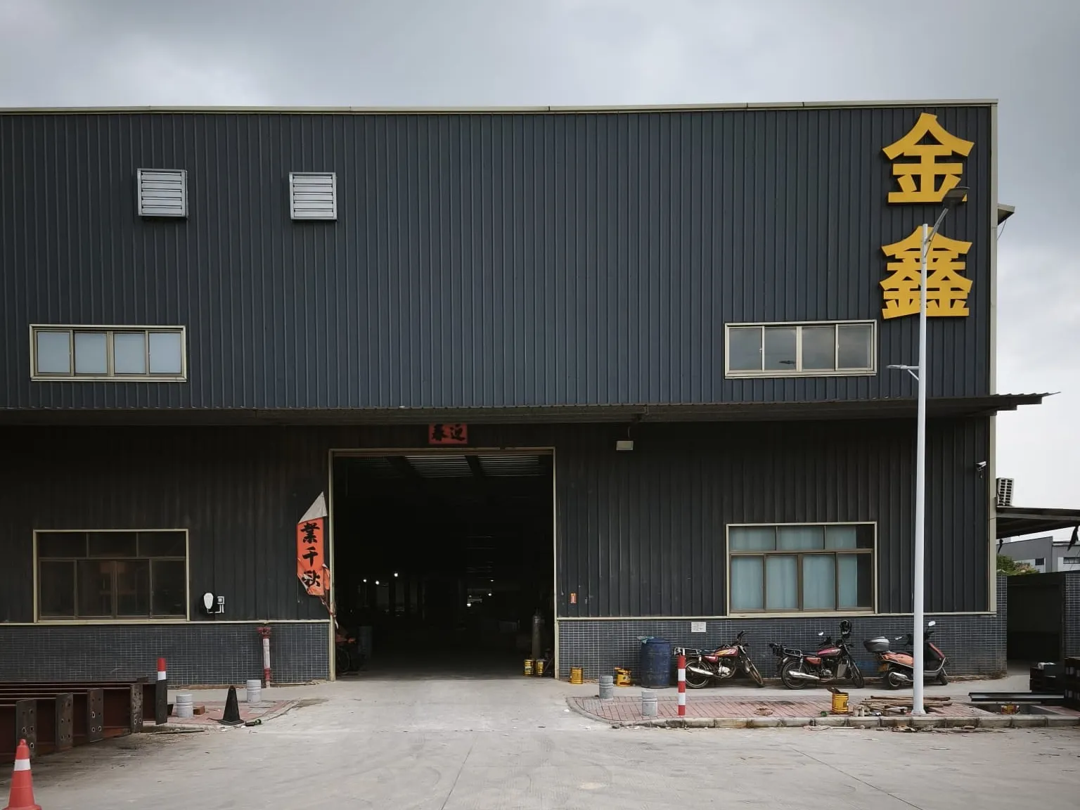 Factory building entrance with loading door at the Yangjiang site