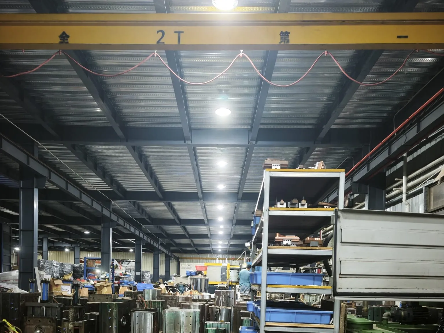 Mould store with shelving and an overhead crane