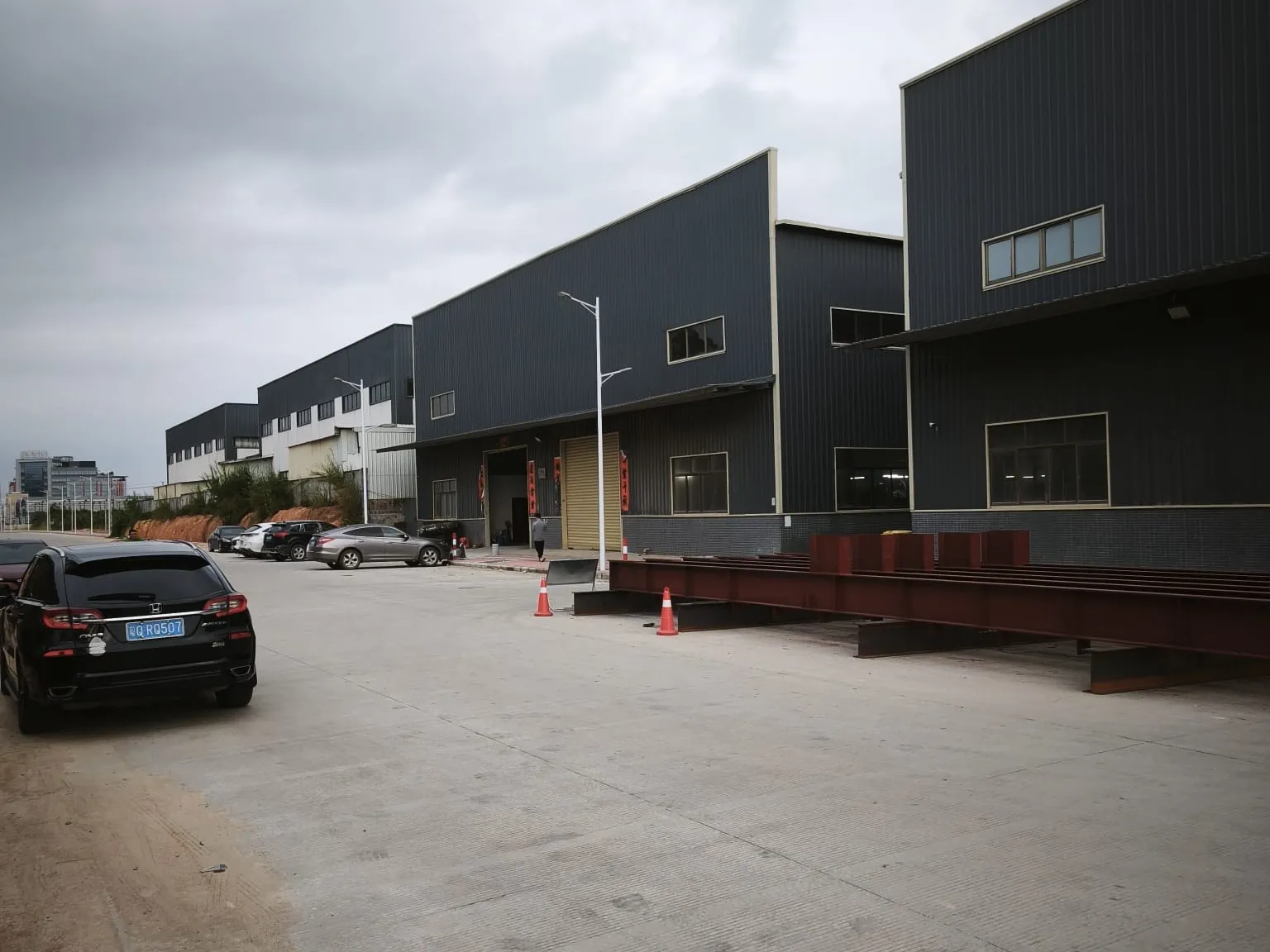 Factory buildings and yard at the Yangjiang manufacturing site
