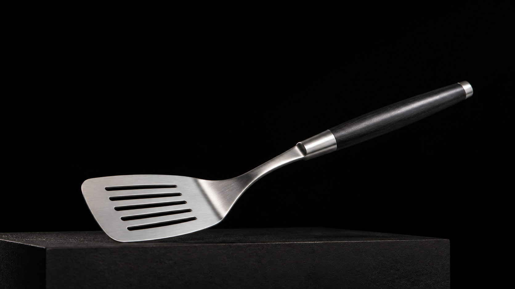Kitchen Turner Spatula product photograph on a dark studio background