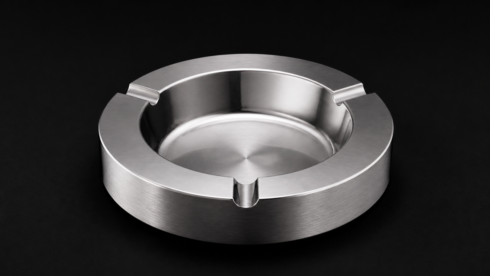 Stainless Steel Ashtray product photograph on a dark studio background