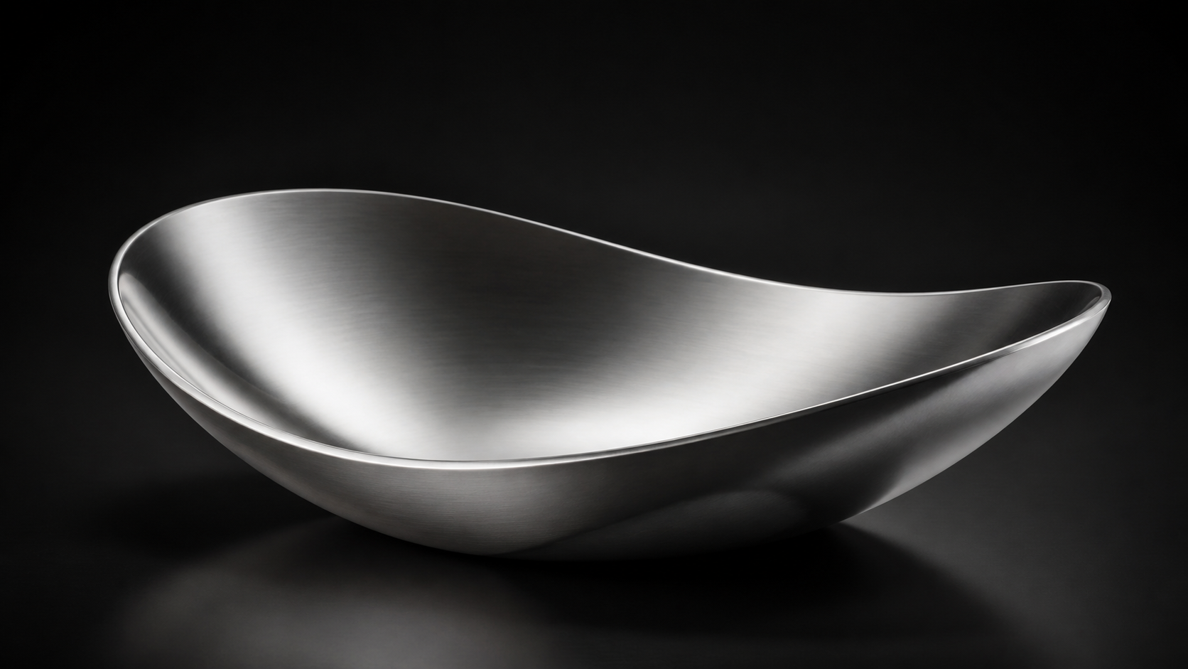 Stainless Steel Fruit Bowl product photograph on a dark studio background