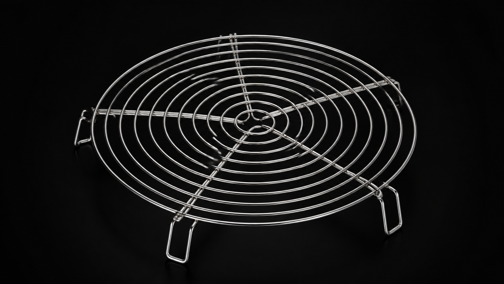 Stainless Steel Steamer Rack product photograph on a dark studio background